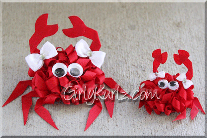 3D crab handmade ribbon sculpture hair clip showing curved claws and vibrant red ribbon