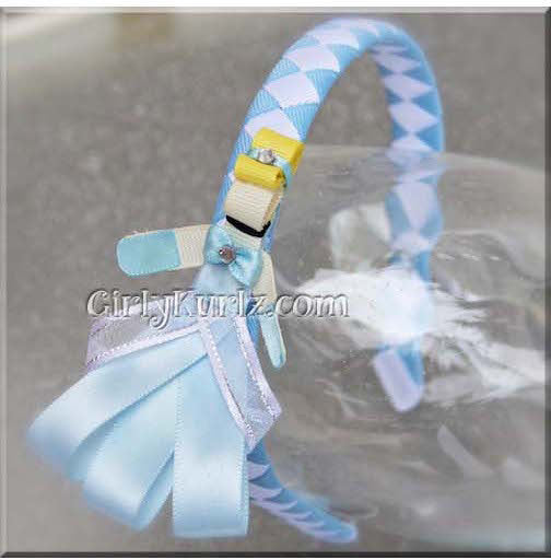 Fairytale-inspired character ribbon clip and matching headband in soft blue tones