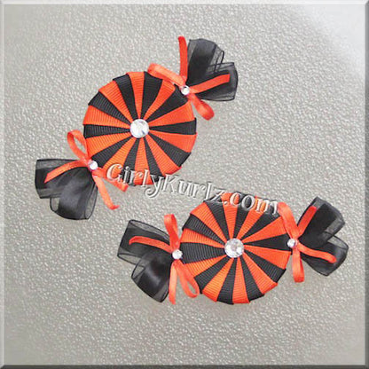 Orange and black Halloween peppermint candy hair clip with orange - handmade ribbon bow