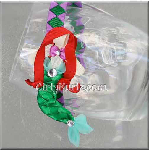 Mermaid-themed ribbon clip and coordinating headband with ocean colors