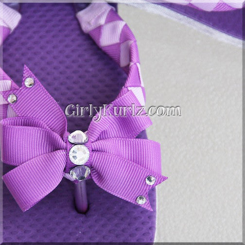 purple woven flip flops