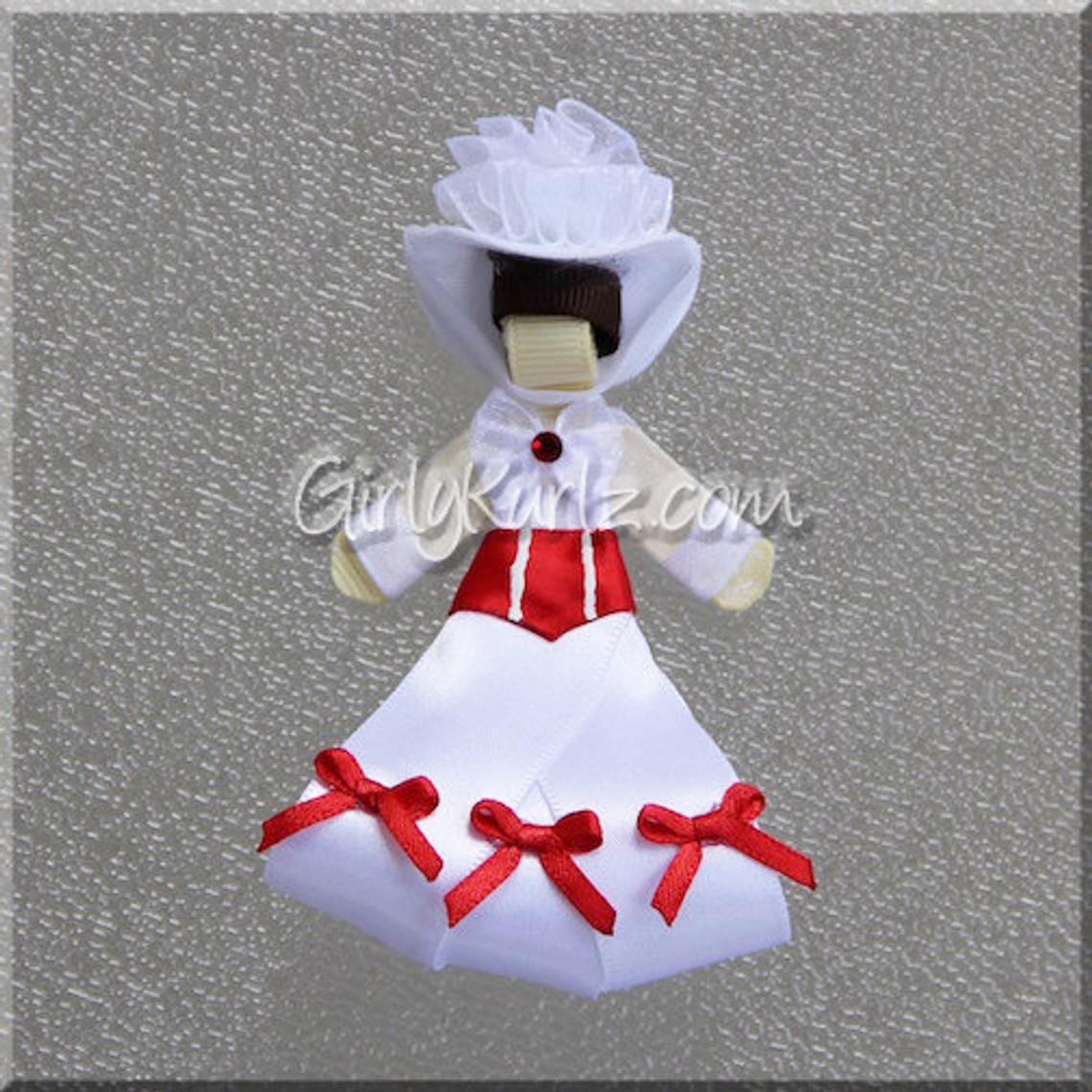 Practically Perfect Nanny ribbon sculpture with navy outfit, red bow, and black hat — DIY tutorial