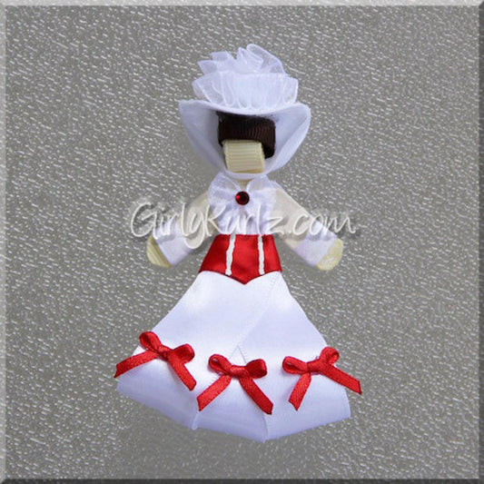 Practically Perfect Nanny ribbon sculpture with navy outfit, red bow, and black hat — DIY tutorial